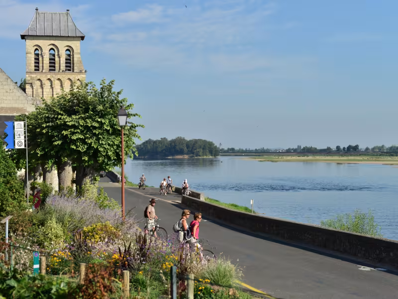 Cyclists on the banks of the Loire in Le Thoureil